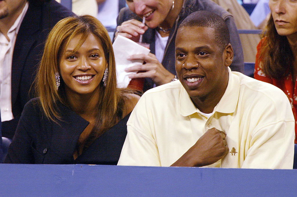 beyonce is with jay z at a tennis game