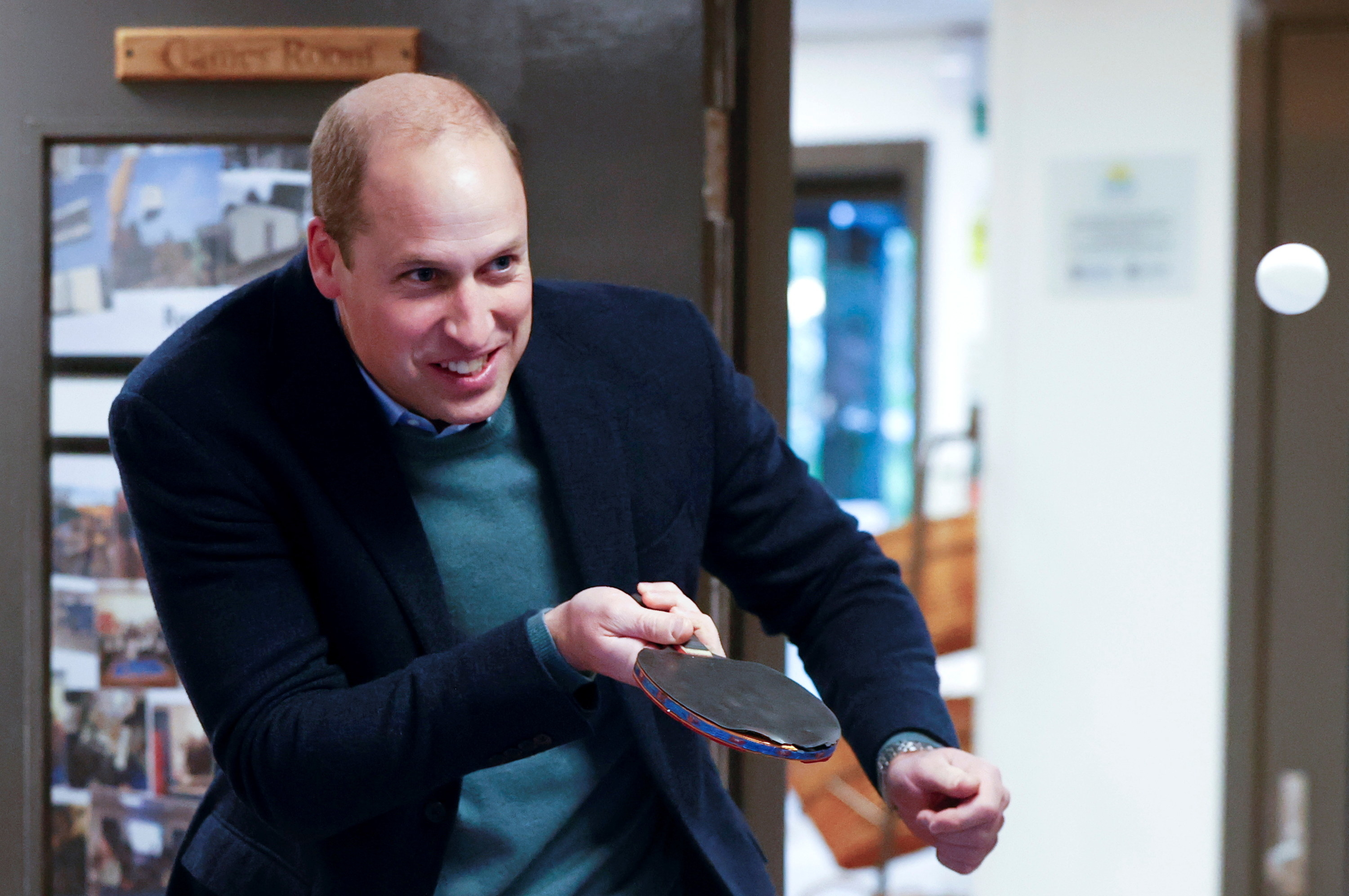 Prince William is playing ping-pong