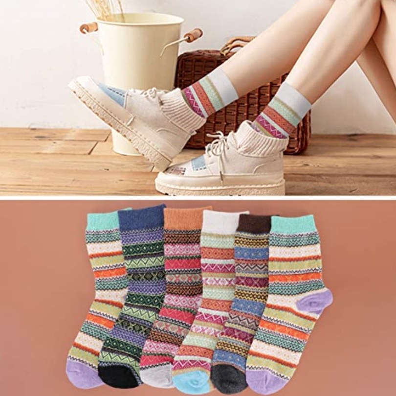 model wearing the socks above a flat lay of the various sock designs