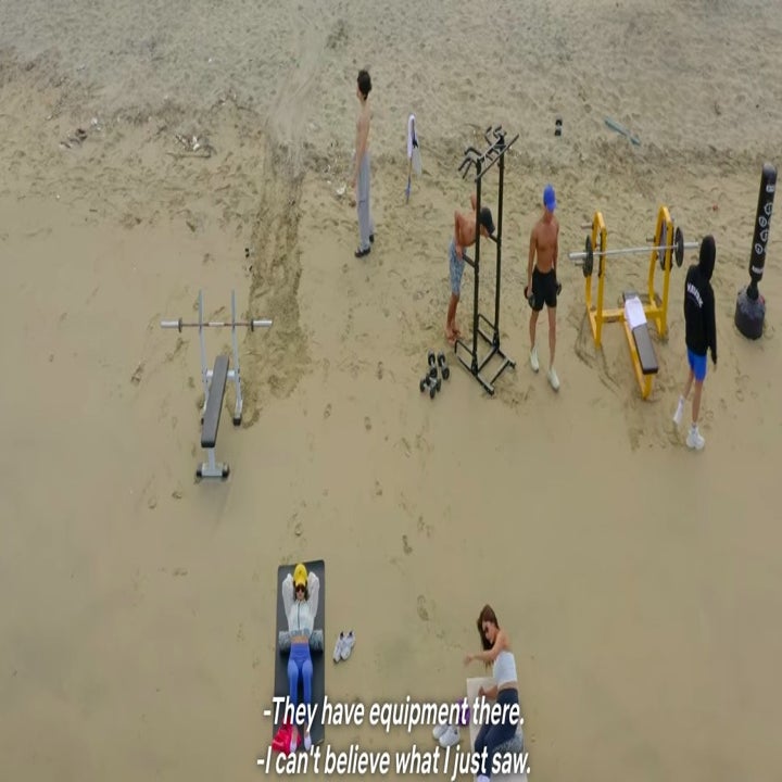 Aerial shot of the singles working out on the beach
