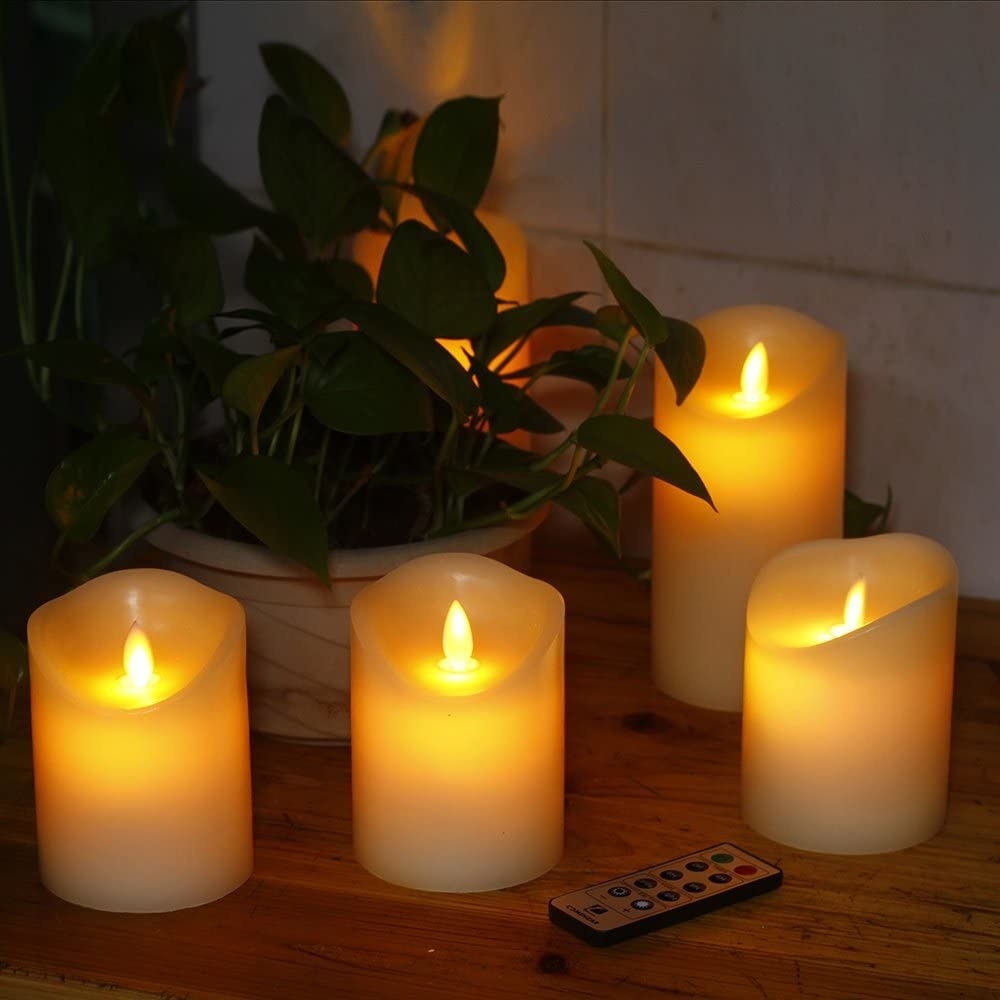 The candles on a table with a plant