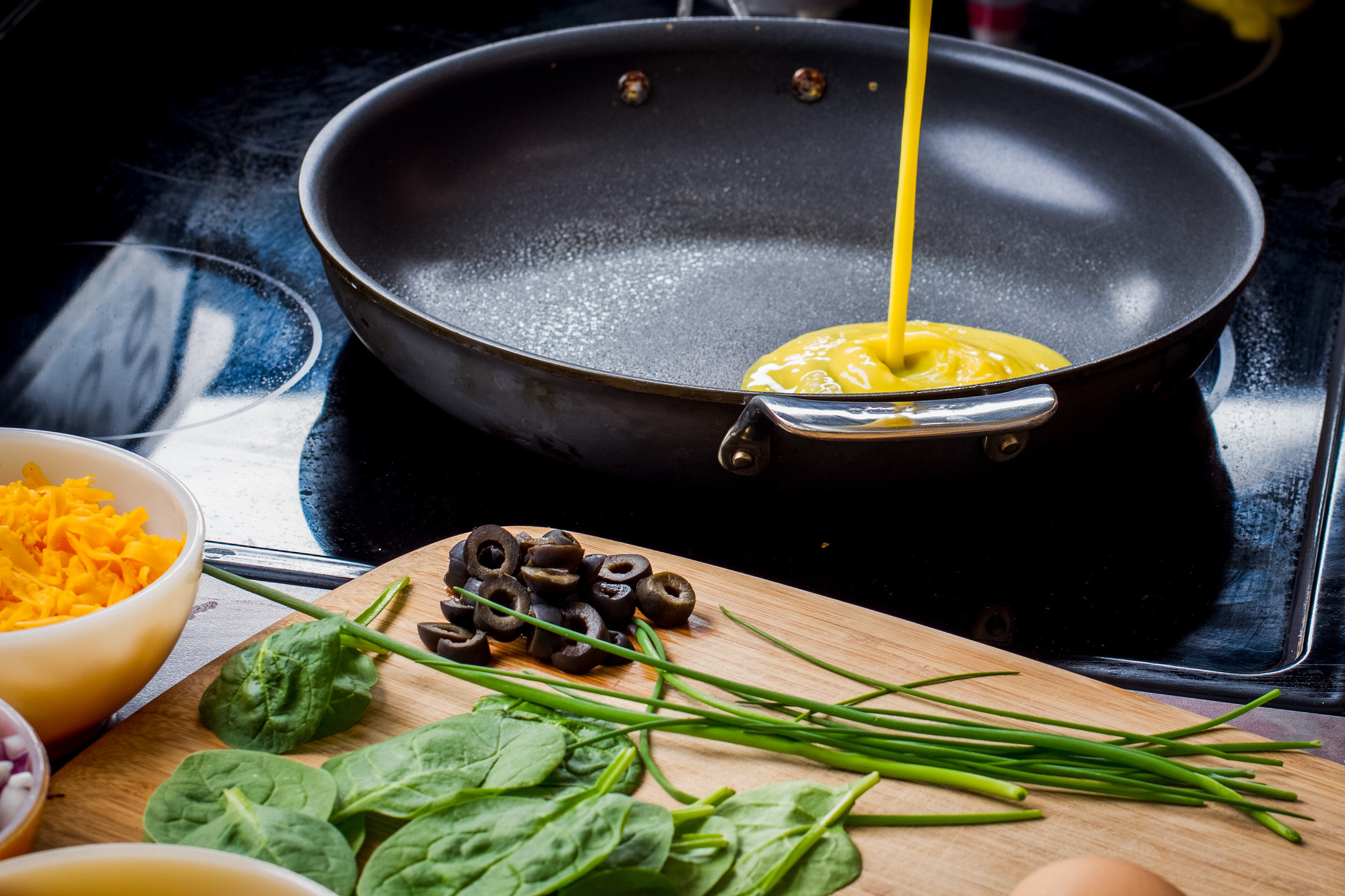 Making an omelet with vegetables.