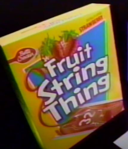 screenshot of Fruit String Thing original packaging from a TV ad