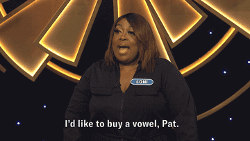 Loni Love competing on Wheel of Fortune and saying