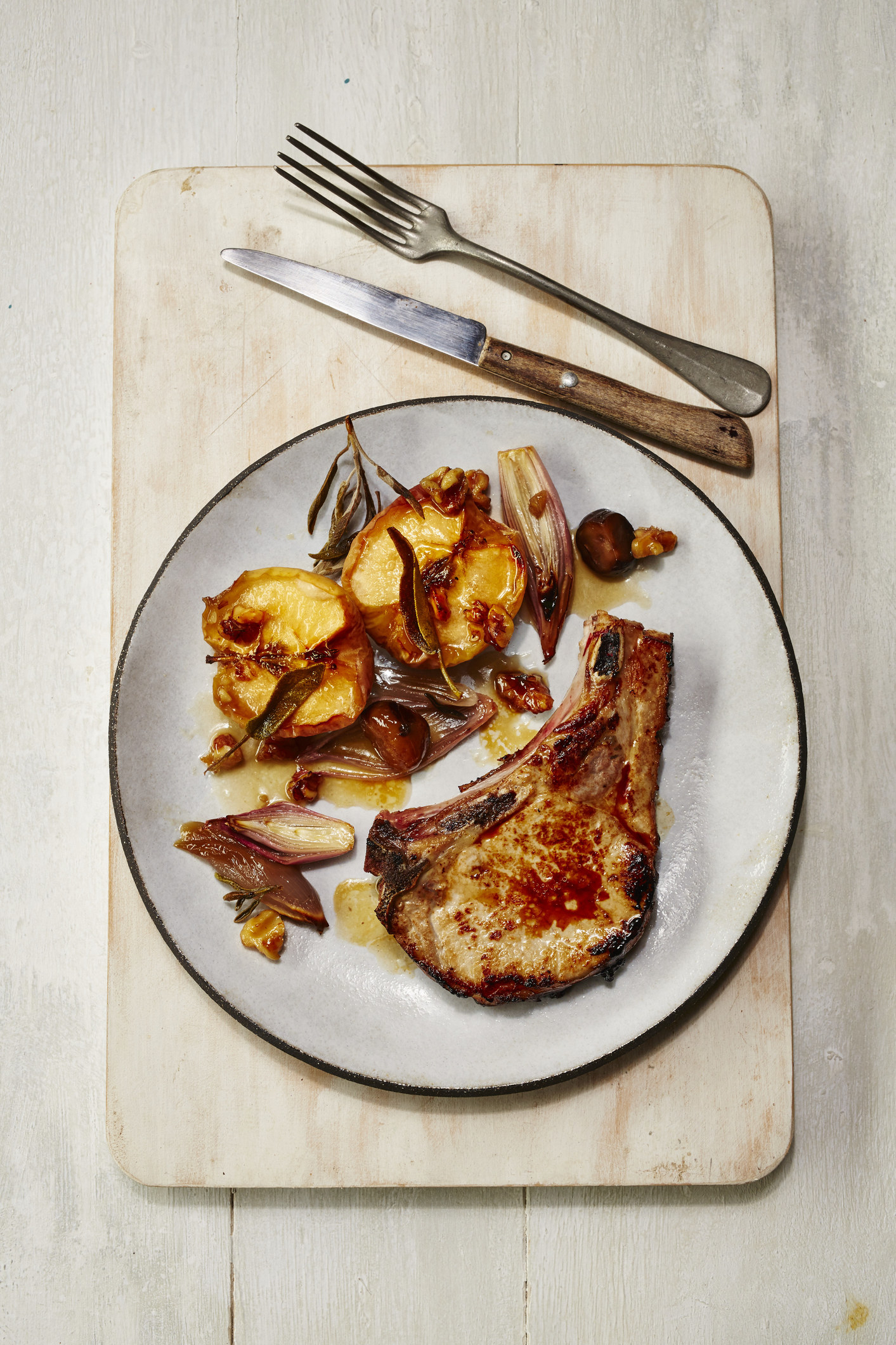 Pork chop with roast apples.