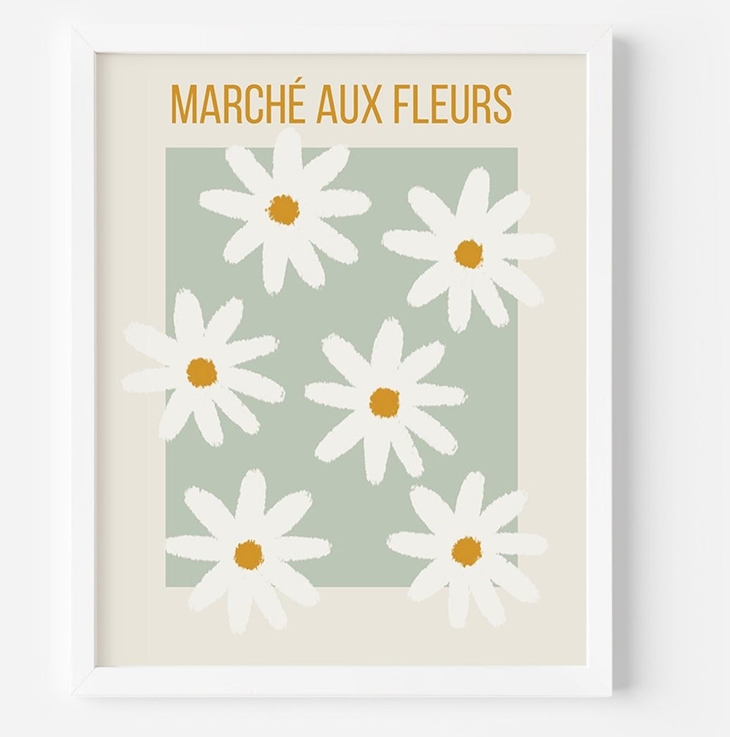 a framed print of flowers