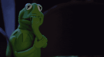 Kermit the frog looking VERY nervous