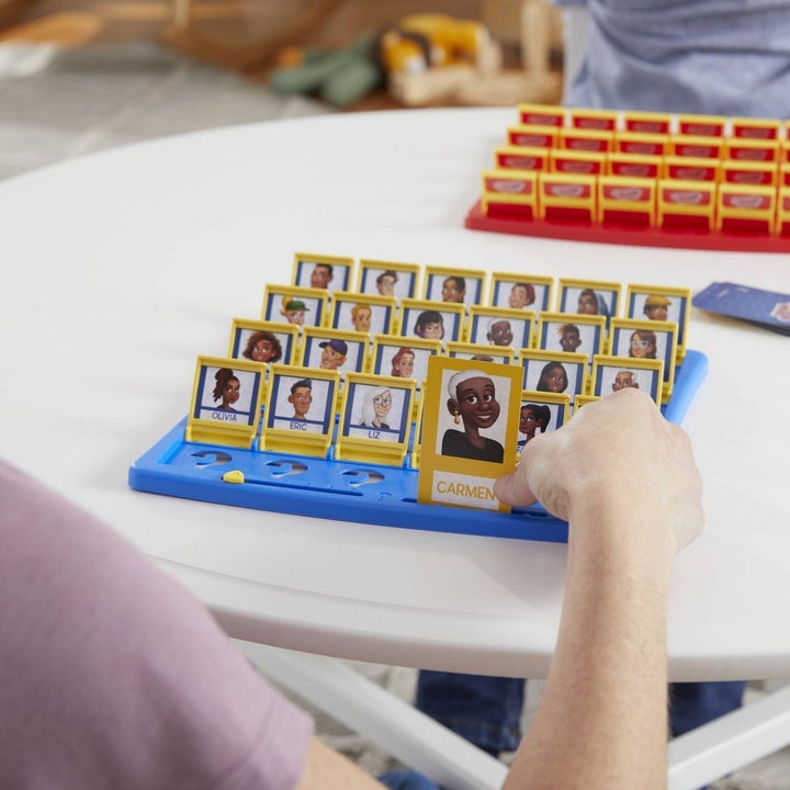 People playing Guess Who?