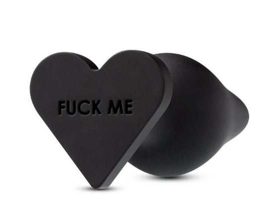 Black anal plug with heart-shaped base and words &quot;fuck me&quot;