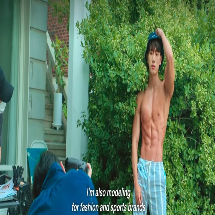 Hyeon-joong poses shirtless in front a cameria