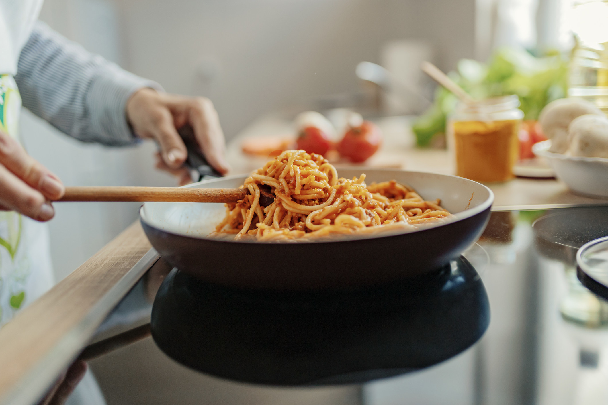 Spaghetti with red sauce in a skillet.