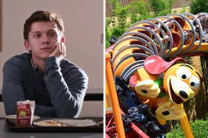 Tom Holland is on the left leaning on a desk with a ride from Disney shown on the right