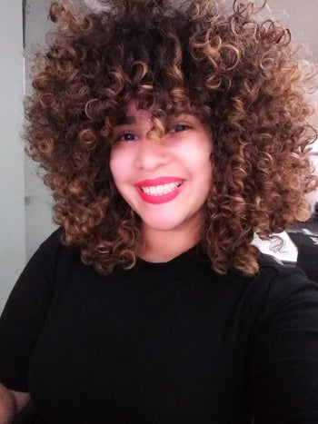 reviewer with big beautiful coils and curls who used the cream