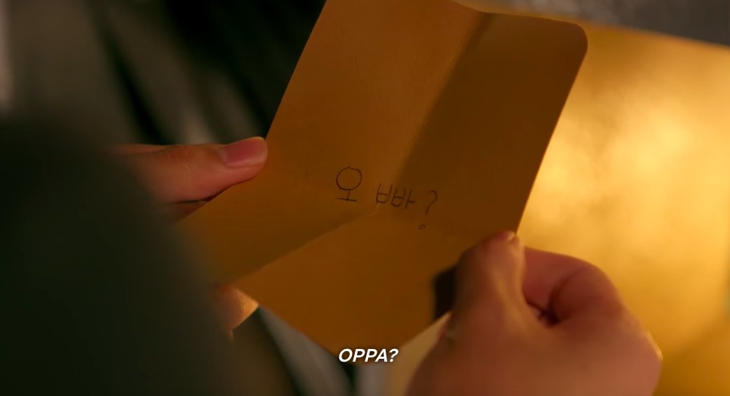 A postcard reading &quot;OPPA?&quot;