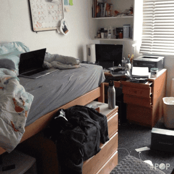 A dorm room is empty and then messy