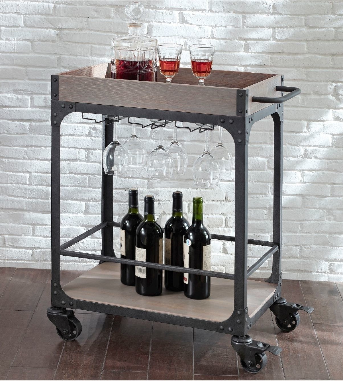wood and metal bar cart with two shelves and wheels