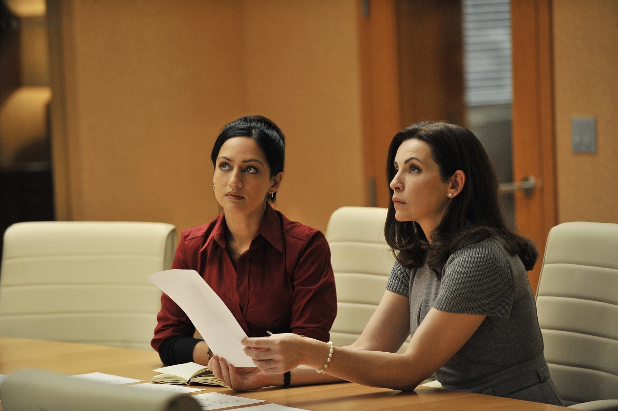 Archie Panjabi and Julianna Margulies in a scene from &quot;The Good Wife&quot;
