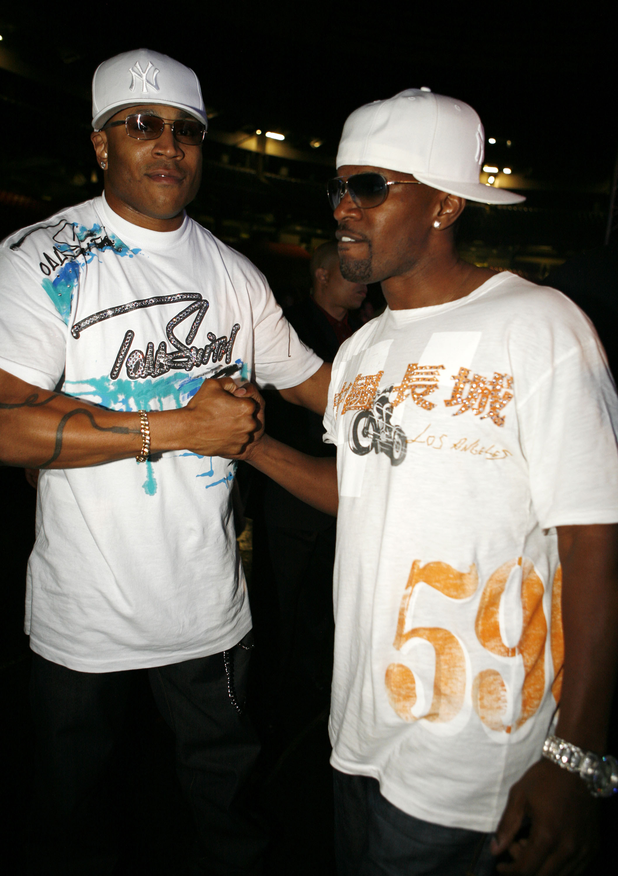 Ll Cool J and Jamie Foxx shaking hands