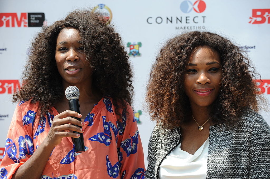 Venus and Serena speaking at an event