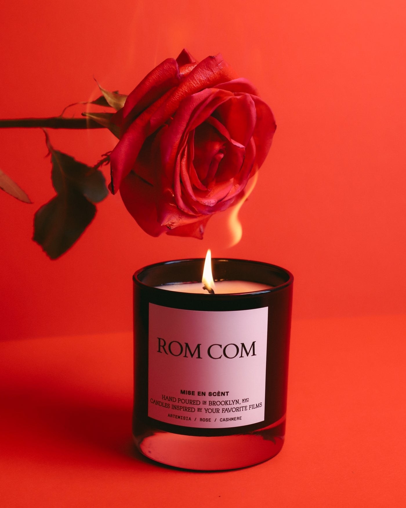 &quot;rom com&quot; candle burning a red rose