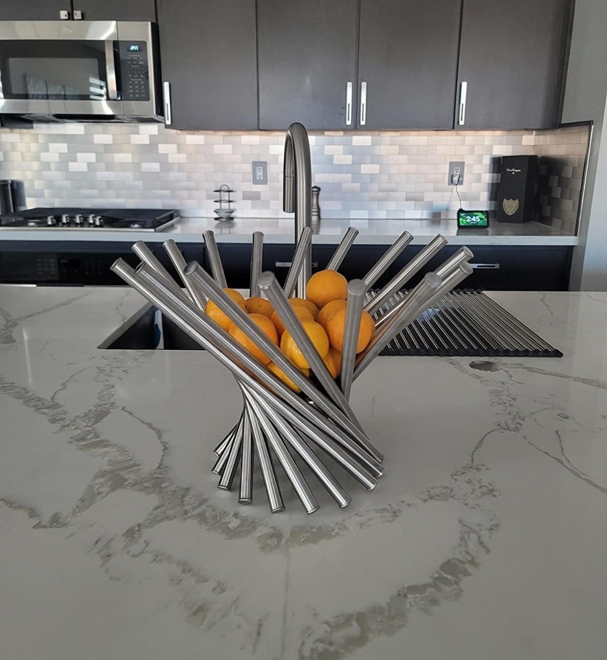 reviewer image of oranges inside the stainless steel fruit holder