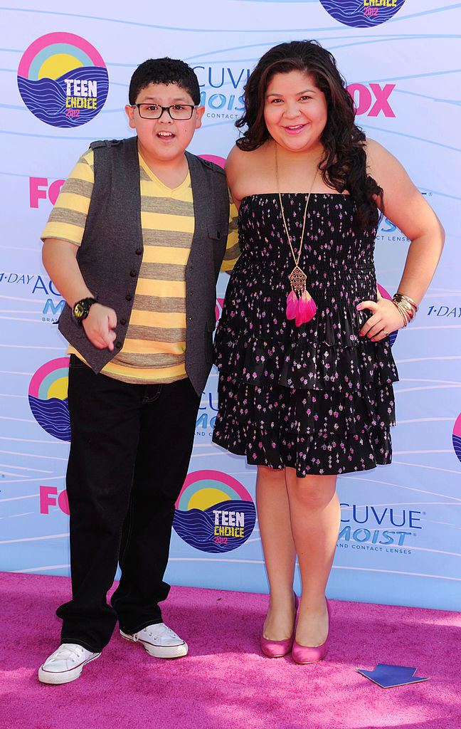 Rico and Raini Rodriguez on a red carpet
