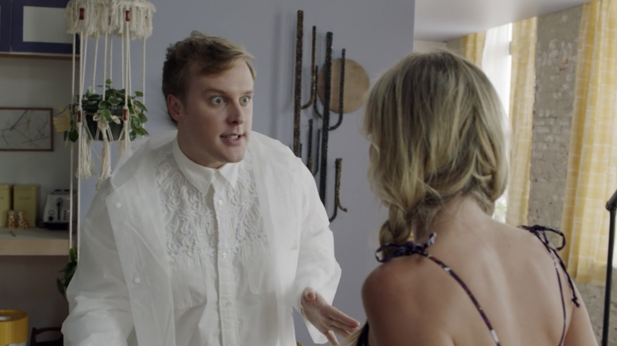 John Early talking to Meredith Hagner.
