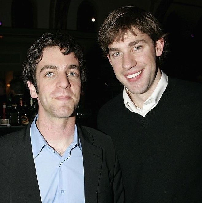 B.J. Novak and John Krasinski smiling at an NBC party