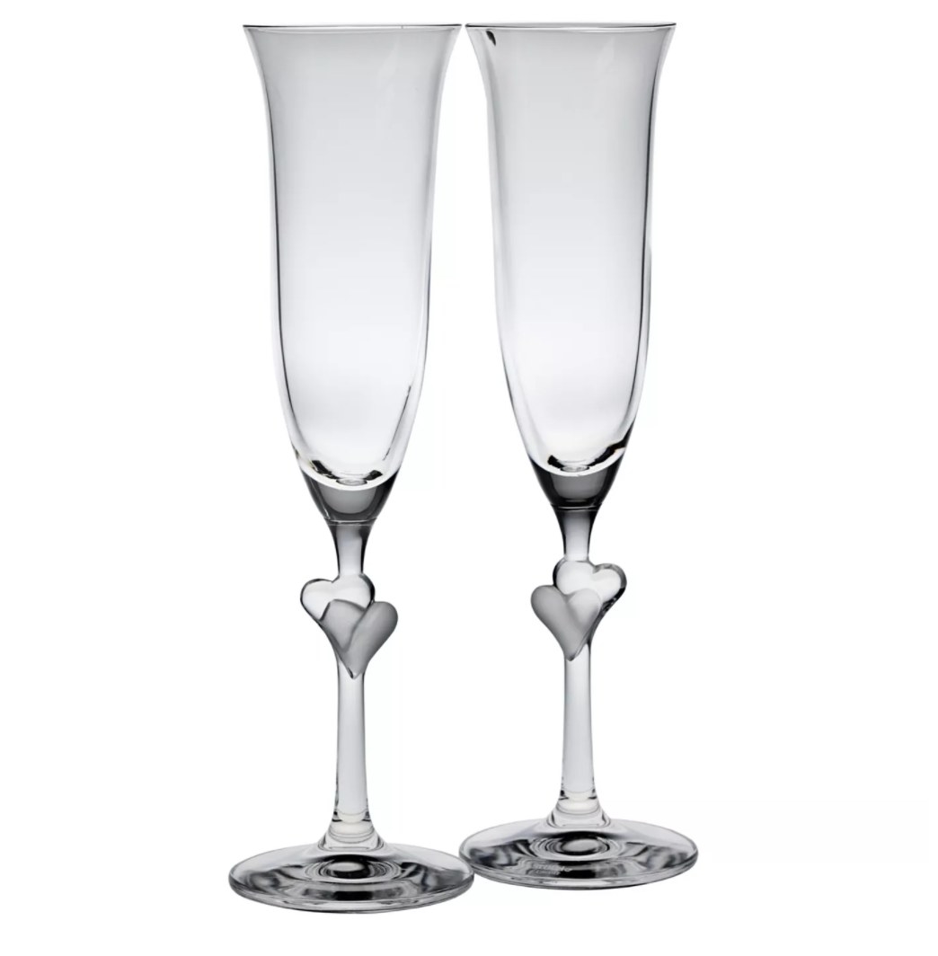 the champagne flutes with hearts on the stems