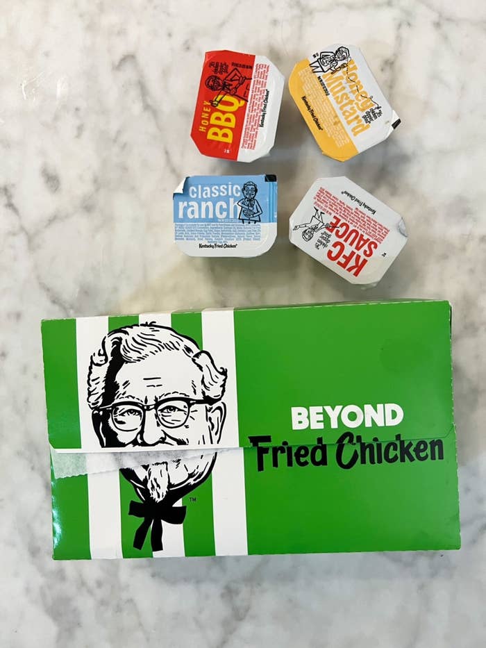 A box of Beyond Fried Chicken and dipping sauces.