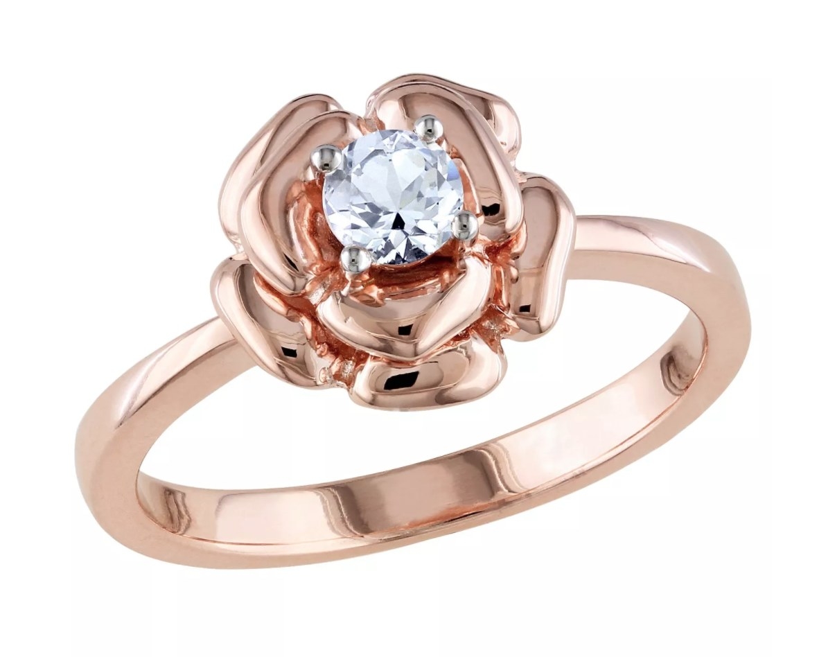 the pink silver flower shaped ring
