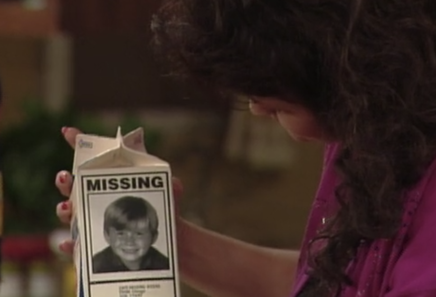 milk carton with photo of Seven labeling him missing