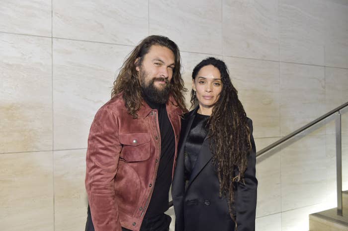 Momoa poses with Bonet on stairs