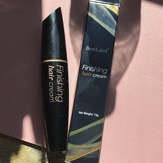 reviewer photo of the finishing stick and its packaging