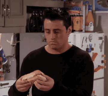 Joey from &quot;Friends&quot; holding a sandwich in his hands