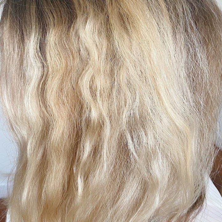 close-up of britt's wavy hair looking hydrated