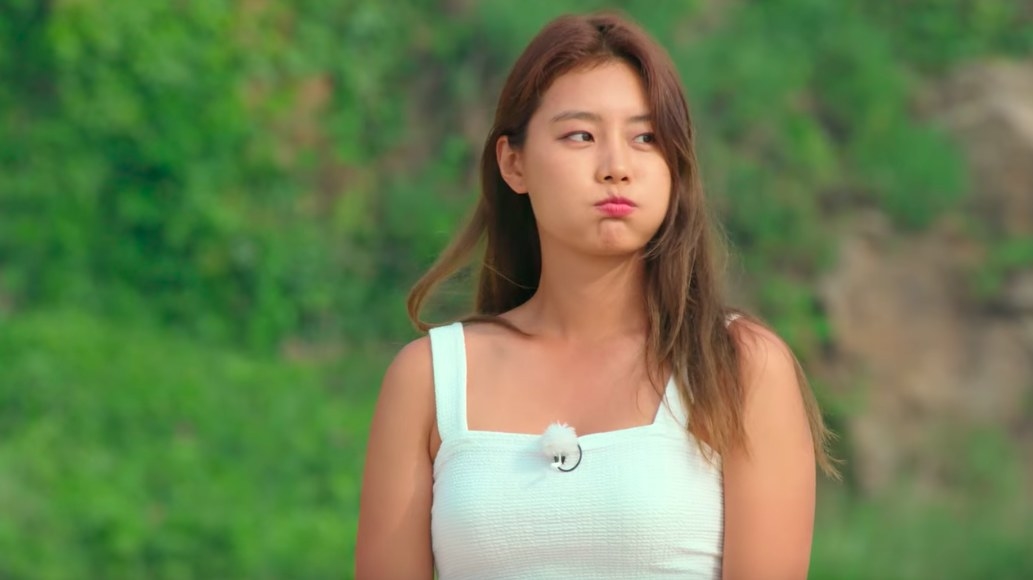 So-yeon looks exasperated as she waits