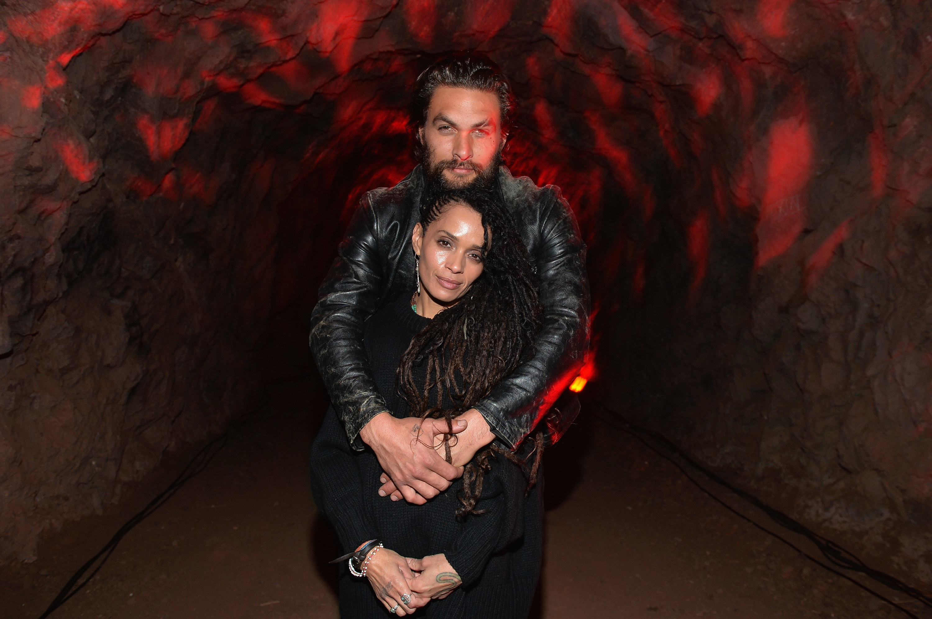 Momoa puts his arms around Bonet