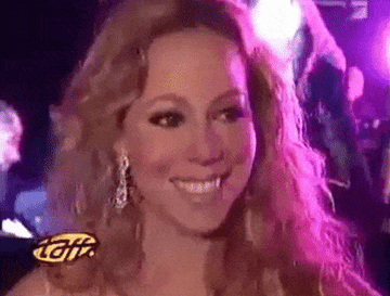 Mariah Carey shaking her head and saying