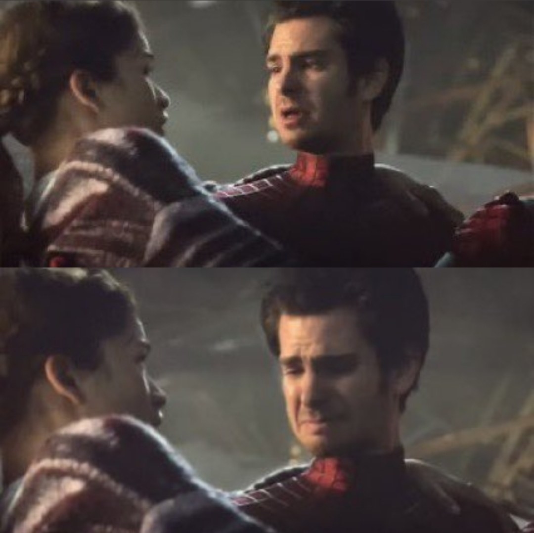 Andrew Garfield&#x27;s Peter Parker holds MJ in his arms and tears well up in his eyes