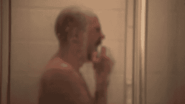 Gif from Arrested Development of a character sobbing in the shower