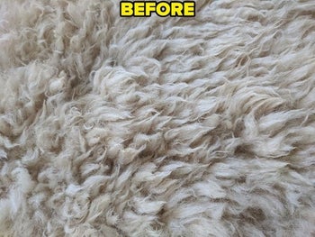 closeup of reviewer's white matted sheepskin rug