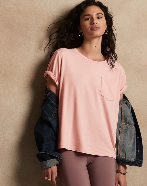 Model wearing pink top with a pink bottom