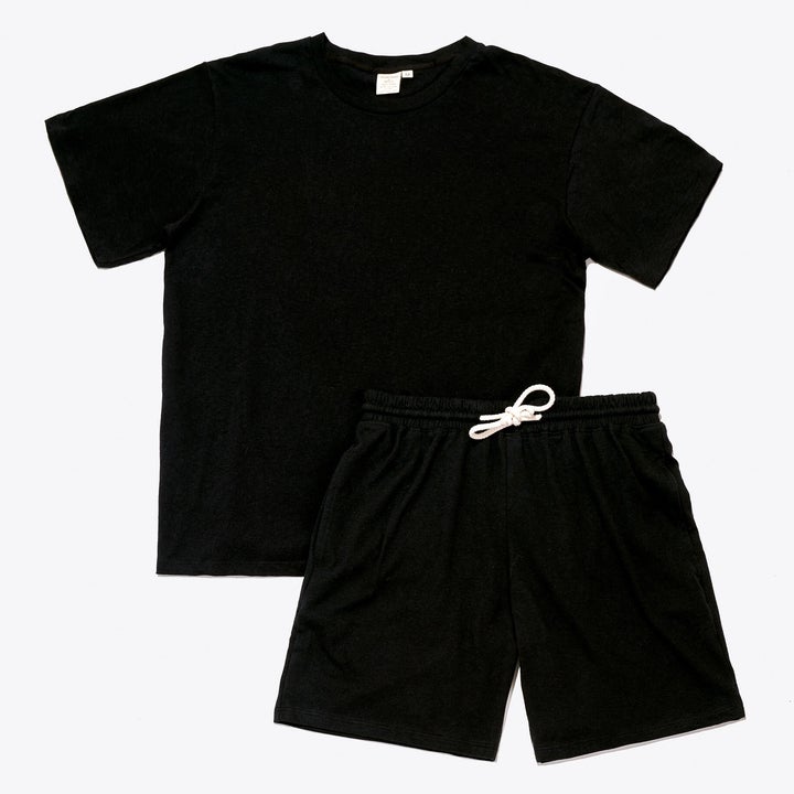 A black T-shirt and matching shorts with a drawstring waistband