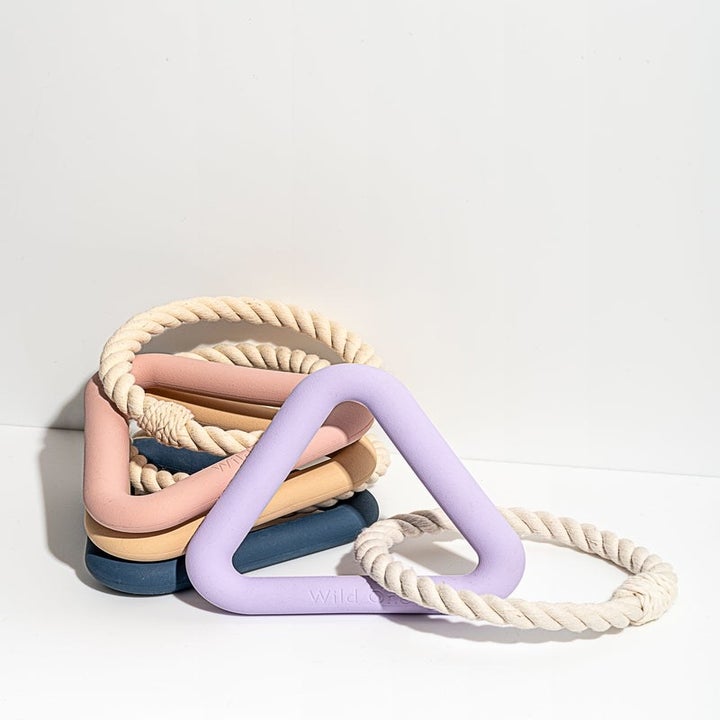 product image of all the different colored triangle tug toys