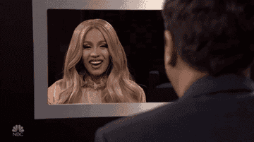 Cardi asking Jimmy Fallon if he's ready to play a game