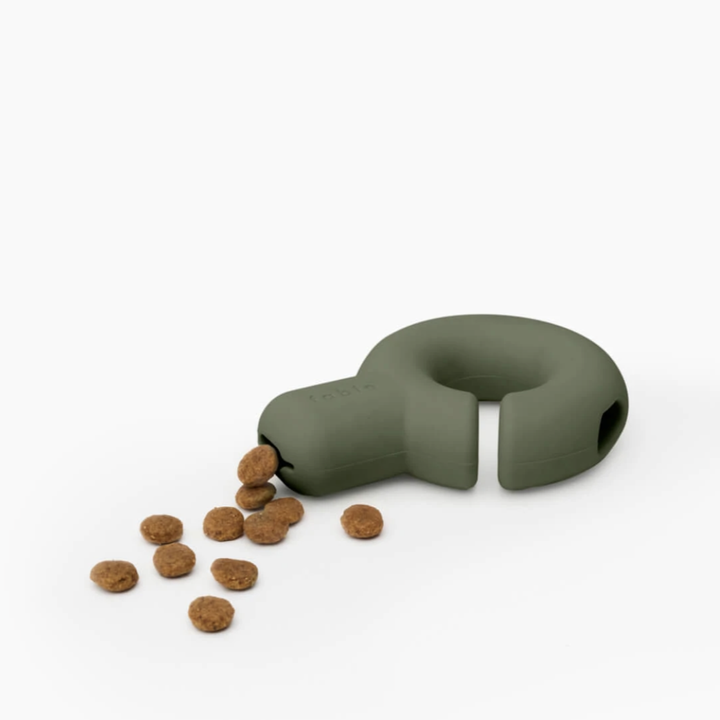 product image, green falcon toy with kibble coming out