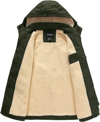 the inside of the coat in green filled with tan fleece