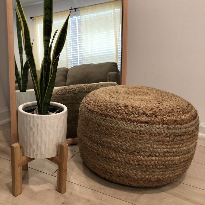 An image of wide round pouf ottoman