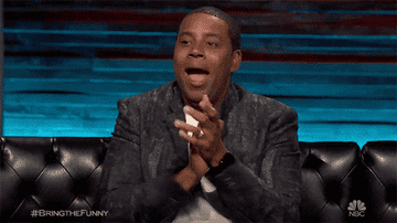 Kenan Thompson claps and cheers on